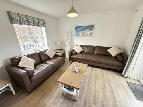 New England Cottage Part of the The Bay Filey Holiday Village with pool gym and direct beach access pub restaurant tennis and meadows walks