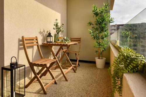 Central Apartments with City View & Large Balcony — 4-Star Luxury Hotel in Bucharest, Romania