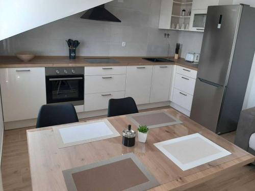 Apartments Dobrila Superior Two Bedroom Apartment with Terrace and sea view B2 — 4-Star Luxury Hotel in Jelsa, Croatia
