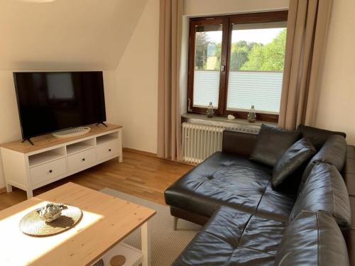 Heimelige Ferienwohnung Nesco mit Balkon und Garten — 4-Star Luxury Hotel in Aurich, Germany