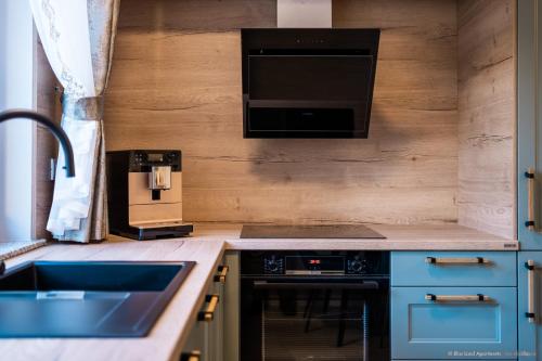 Bliss Land Luxury Apartments — 4-Star Luxury Hotel in Gura Humorului, Romania