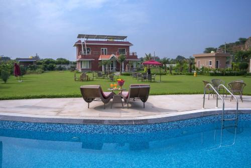StayVista at Hillside Paradise 4BHK Villa with Jacuzzi kids play area view of Aravalli Hills