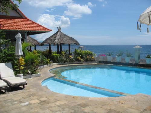 Kembali Beach Bungalows - carbon neutral hotel in Abang