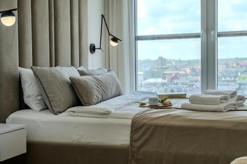 Urban Apartments Luxury Skyline Sokolska Towers 30A 2 Free Garages Gym & Sauna Self Check In in Katowice, Poland