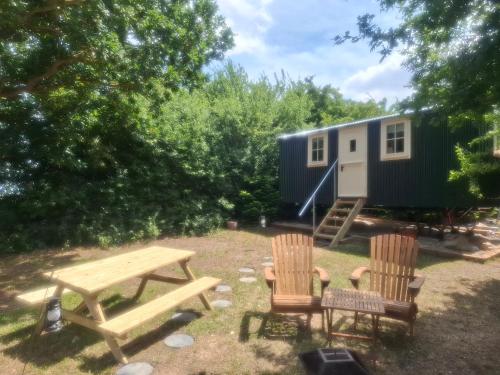 Hill Top Hideaway Shepherds Hut with Hot Tub in Chelmsford, United Kingdom