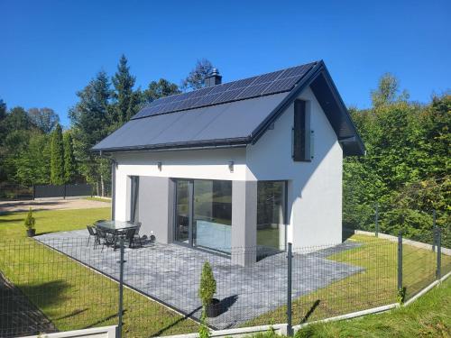 Domek Całoroczny - carbon neutral hotel in Stroza