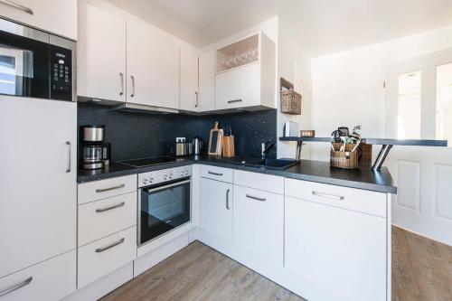 Haus Deichkieker Apartment 3 2 Tide — 4-Star Luxury Hotel in Busum, Germany