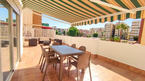 La Terraza de MarA a Alojamientos La Torre in Torre Del Mar, Spain