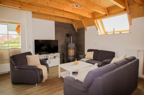 Ferienhaus Helga s Sonnenplatz Edi Oehmsen 02 in Dorum, Germany