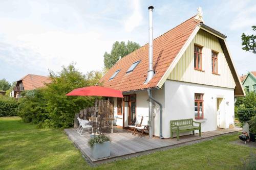 Ferienhaussiedlung Strandperlen Sanddornhof 1b Typ III — carbon neutral stay, Wustrow