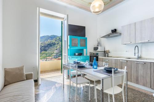 Hostdomus Casa Ester — 4-Star Luxury Hotel in Noli, Italy