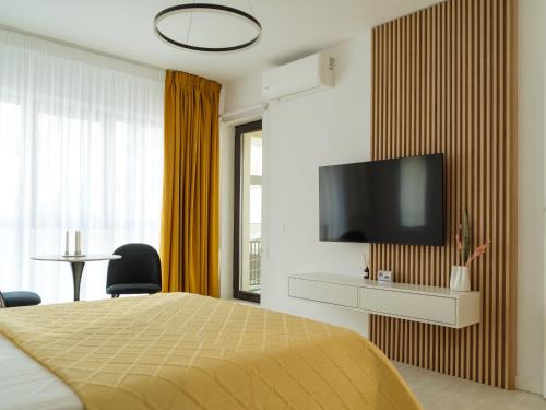 Yellow Charm Plaza Apartment Lujerului — 4-Star Luxury Hotel in Bucharest, Romania