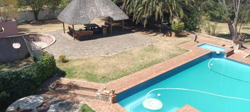 Rozani's - carbon neutral hotel in Unknown City