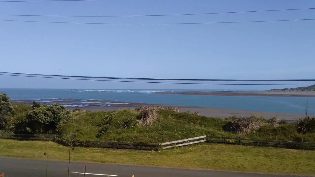 Karoro the Beach Front Bach with Views To Die For in Raglan, New Zealand