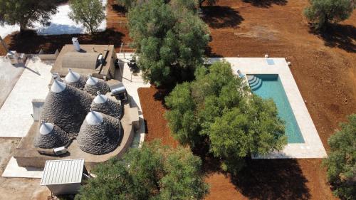 Trullo Le Rondinelle — 4-Star Luxury Hotel in San Michele Salentino, Italy