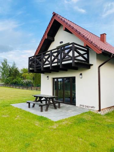 O Wilku Mowa domki całoroczne in Mikolajki, Poland