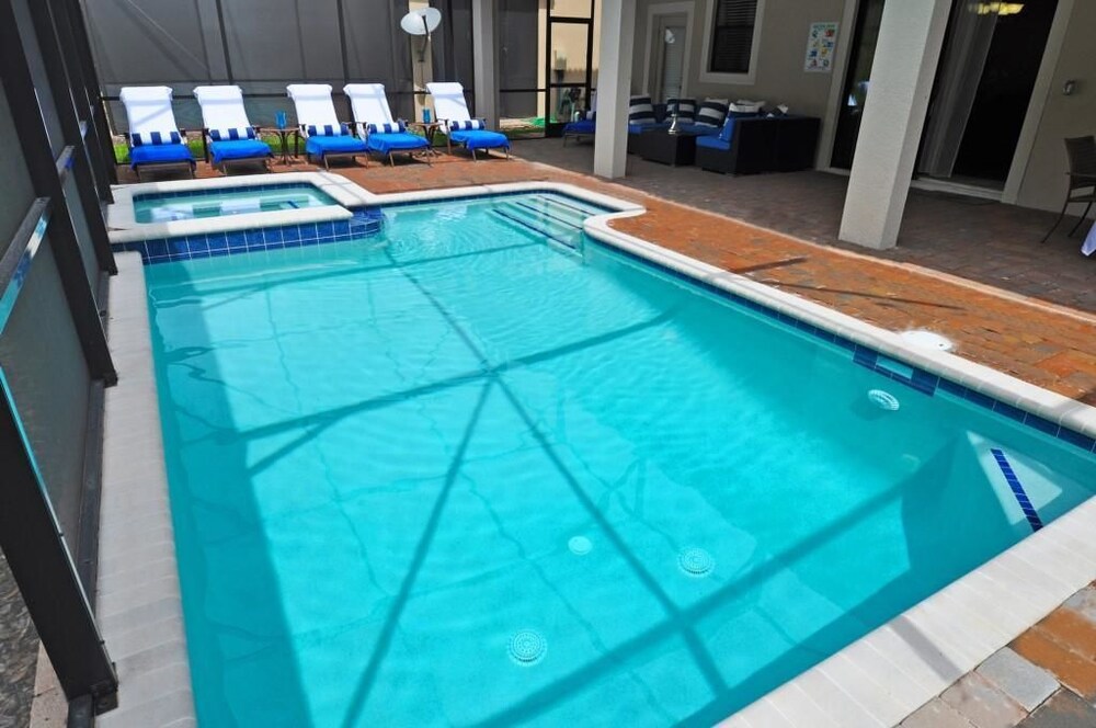 Fabulous 8 Bed 5 Bath Pool Home in Championsgate Golf Resort - photo 16