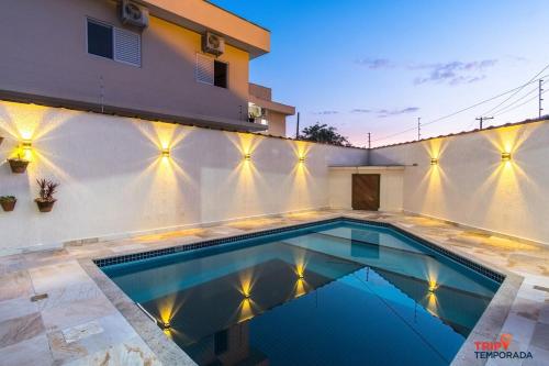 Casa na Praia Grande com piscina churrasqueira e ar condicionado 04 dormitórios — 4-Star Luxury Hotel in Ubatuba, Brasil