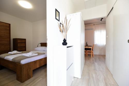 Apartman u atraktivnoj kuci u nizu s garazom in Unknown City, Croatia