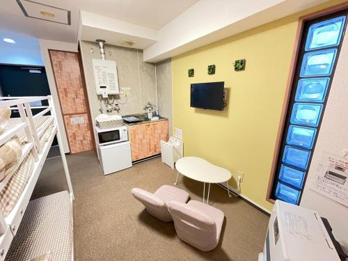 Room 303 Aruter Hotel Sapporo 10 minute walk from Sapporo Station Retro Japandi Room Vacation STAY 18864 — hotel near Sapporo Okadama Airport