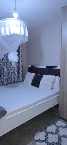 One bedroom at Tsavo fedha