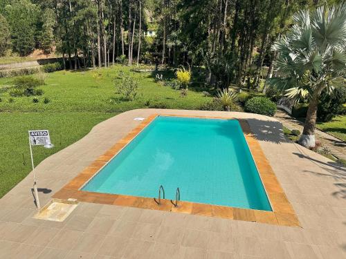 Sítio Exclusivo com Área Gourmet Piscina e Natureza - carbon neutral hotel in Unknown City