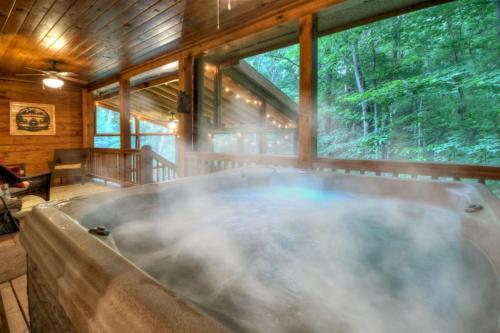 Four Seasons Wood burning fireplace cozy hot tub comfy beds