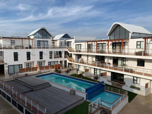 Modern Beachfront with swimming pool 27 Azure Blouberg Cape Town