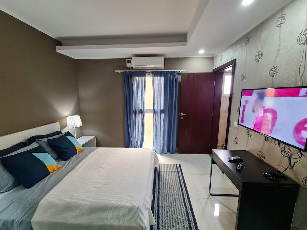 Guest House Sleeps 14 with Terrace — 4-Star Luxury Hotel in Luanda, Angola