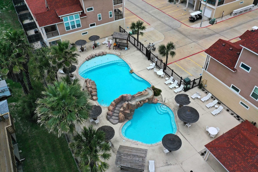 Private Yard Cornhole Resort Pool Oasis w Slide Down the Shore by Avantstay - photo 33