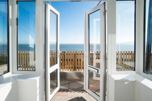 Abalyne Beach House Stunning 4 bedroom beach house Sea views throughout modern and bright house