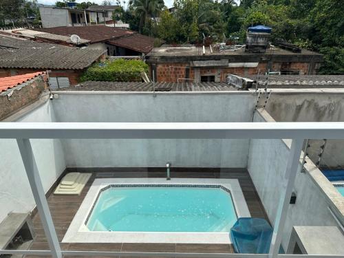 Lindo Sobrado Centro Bertioga - carbon neutral hotel in Bertioga