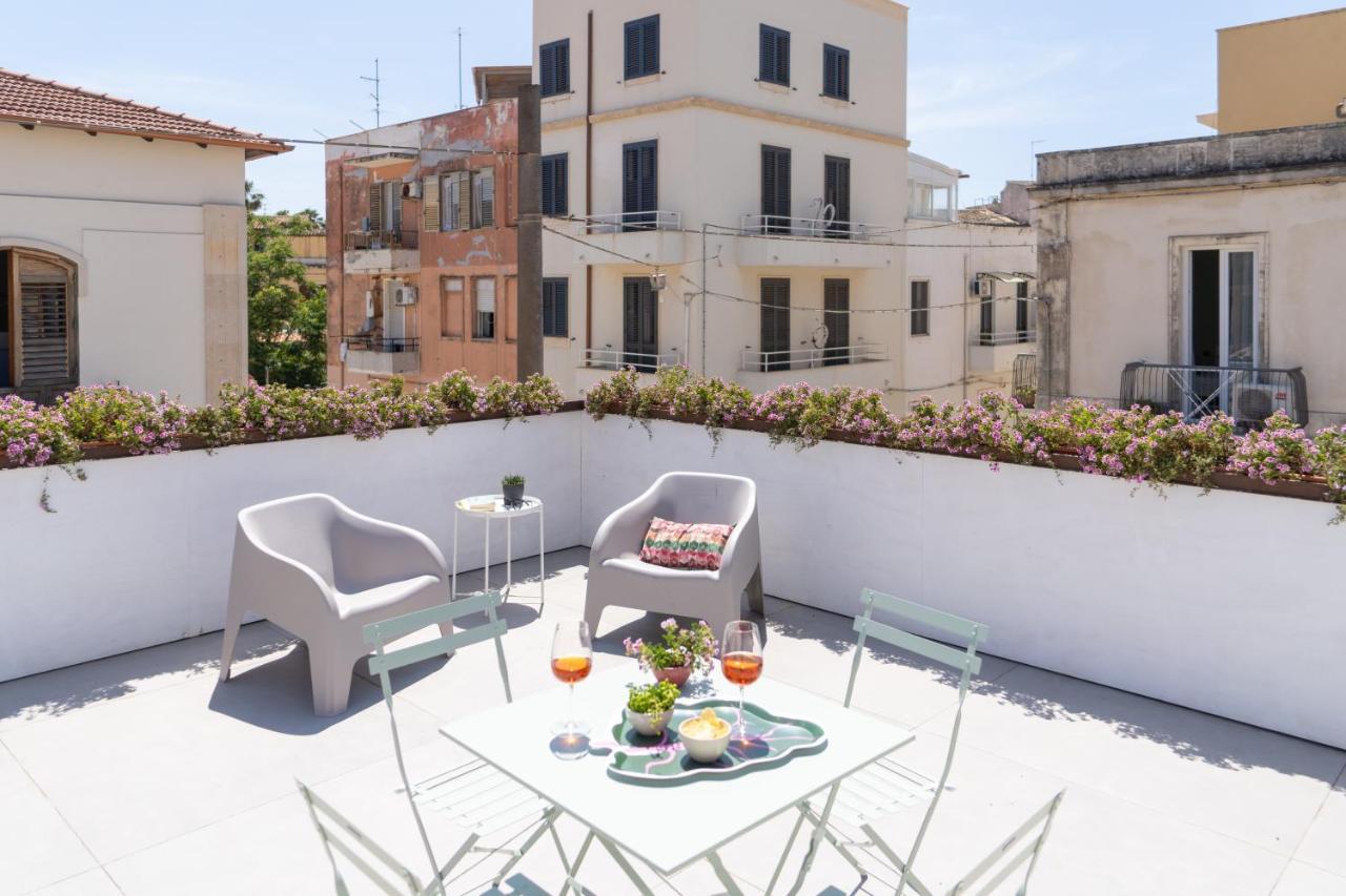 GuestHost Santa Lucia Charming Apartment with Terrace — 4-Star Luxury Hotel in Siracusa, Italy