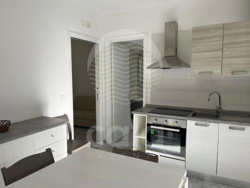 Bilocale Adorno Spiaggia a 10m By Cala Salento — 4-Star Luxury Hotel in Porto Cesareo, Italy