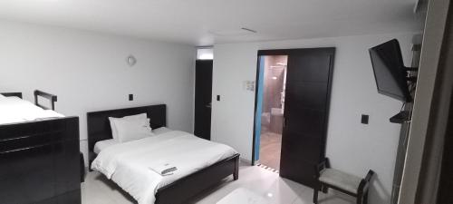 Hotel Centenario Plaza — Belen — photo 5