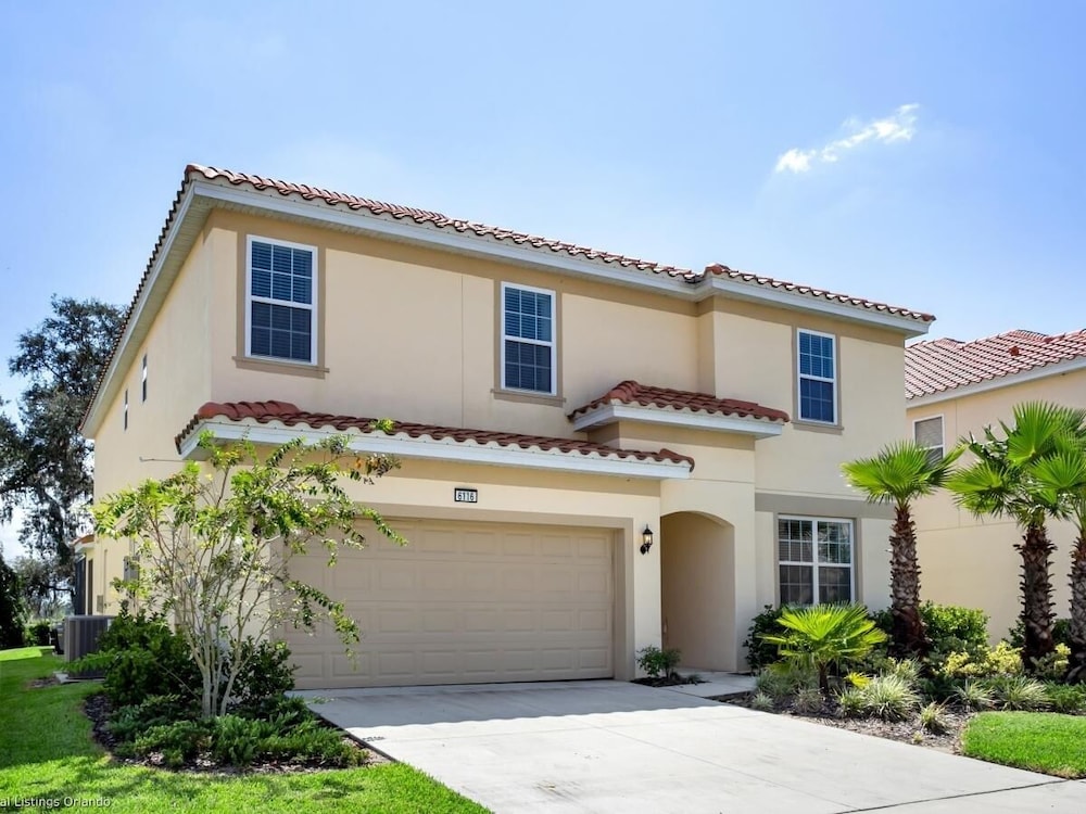 Beautiful 9 bedroom pool home located in the Solterra Resort home - featured photo
