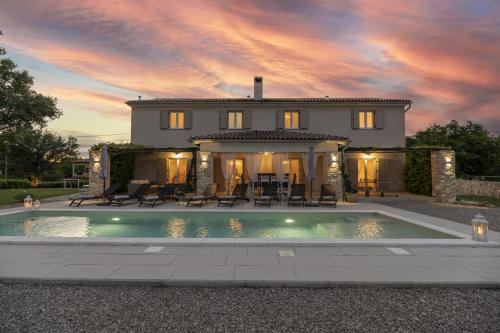 Villa Batelica with large garden kids playground and private pool — 4-Star Luxury Hotel in Labin, Croatia