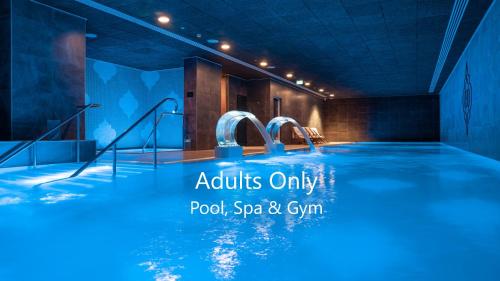 E1 Suites Spa Aparthotel Style Gym Spa — Unknown City