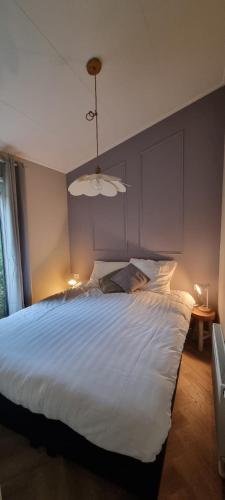 Boslodge Bosmus 4 personen tussen de bomen in Nunspeet, Netherlands