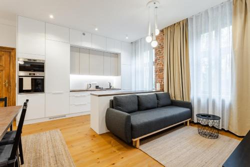 Two Bedroom Very Berry Apartment in Poznań with Desk by Noclegi Renters — 4-Star Luxury Hotel in Poznan, Poland