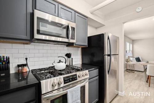 Walk to Restaurants or Cook in Subway Tile Kitchen — 4-Star Luxury Hotel in Austin, United States