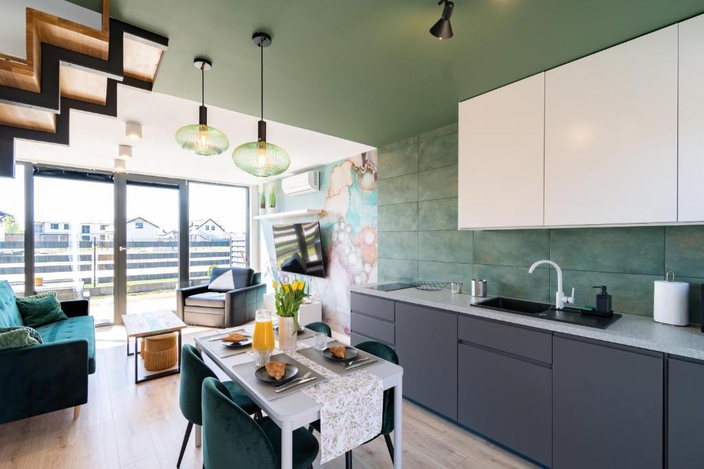 Domki Bursztynova 13 in Leba, Poland