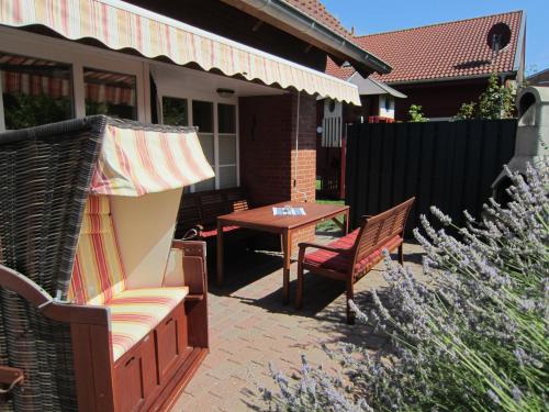 Ferienhaus Kleiner Leuchtturm Backbord mit Garten und Terrasse — carbon neutral stay, Fehmarn