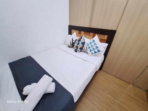 Bright and Cozy 1 Bedroom with Balcony Pool View and WiFi in Grace Residences — 4-Star Luxury Hotel in Manila, Philippines