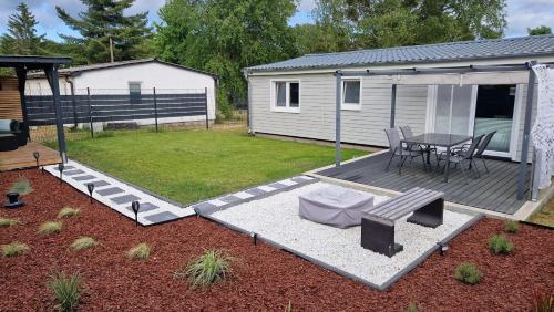 Ferienhaus Seeoase 70qm Kamin Terrassen Parkplatz Badestelle fußläufig — hotel in Joachimsthal