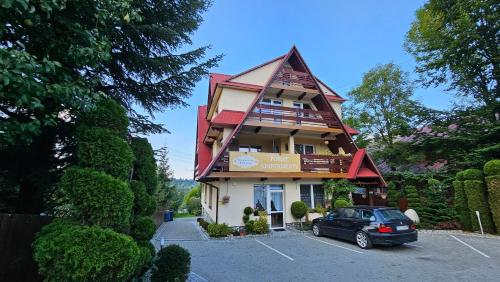 Bukowiański Dworek Wyciągi Narciarnia Kuchnia in Bukowina Tatrzanska, Poland