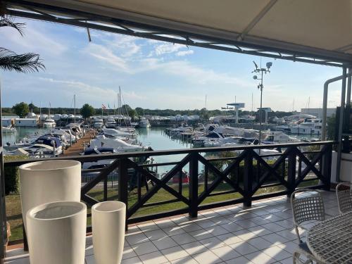 Welc ōM Lignano swim and fun with dock view — 4-Star Luxury Hotel in Lignano Sabbiadoro, Italy