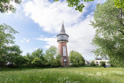 Husumer Wasserturm Ferienwohnung 1 — 4-Star Luxury Hotel in Husum, Germany