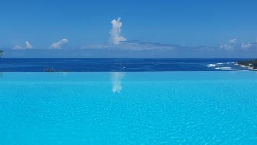 Villa Antelisa piscine et vue océan — 4-Star Luxury Hotel in Saint-Paul, Réunion