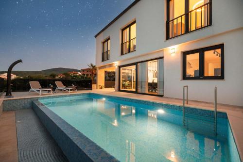 Villa SUNSET I with private pool and beautiful sea view — 4-Star Luxury Hotel in Vrbnik, Croatia